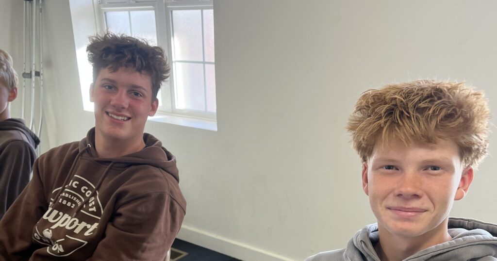 Two Pathways Christian Academy students working together in a small class in Boise, Idaho